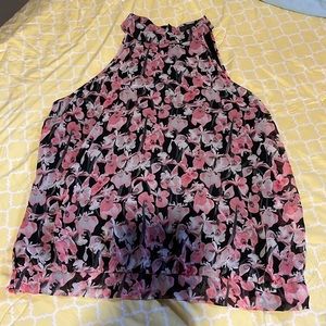 Sleeveless, sheer, floral blouse